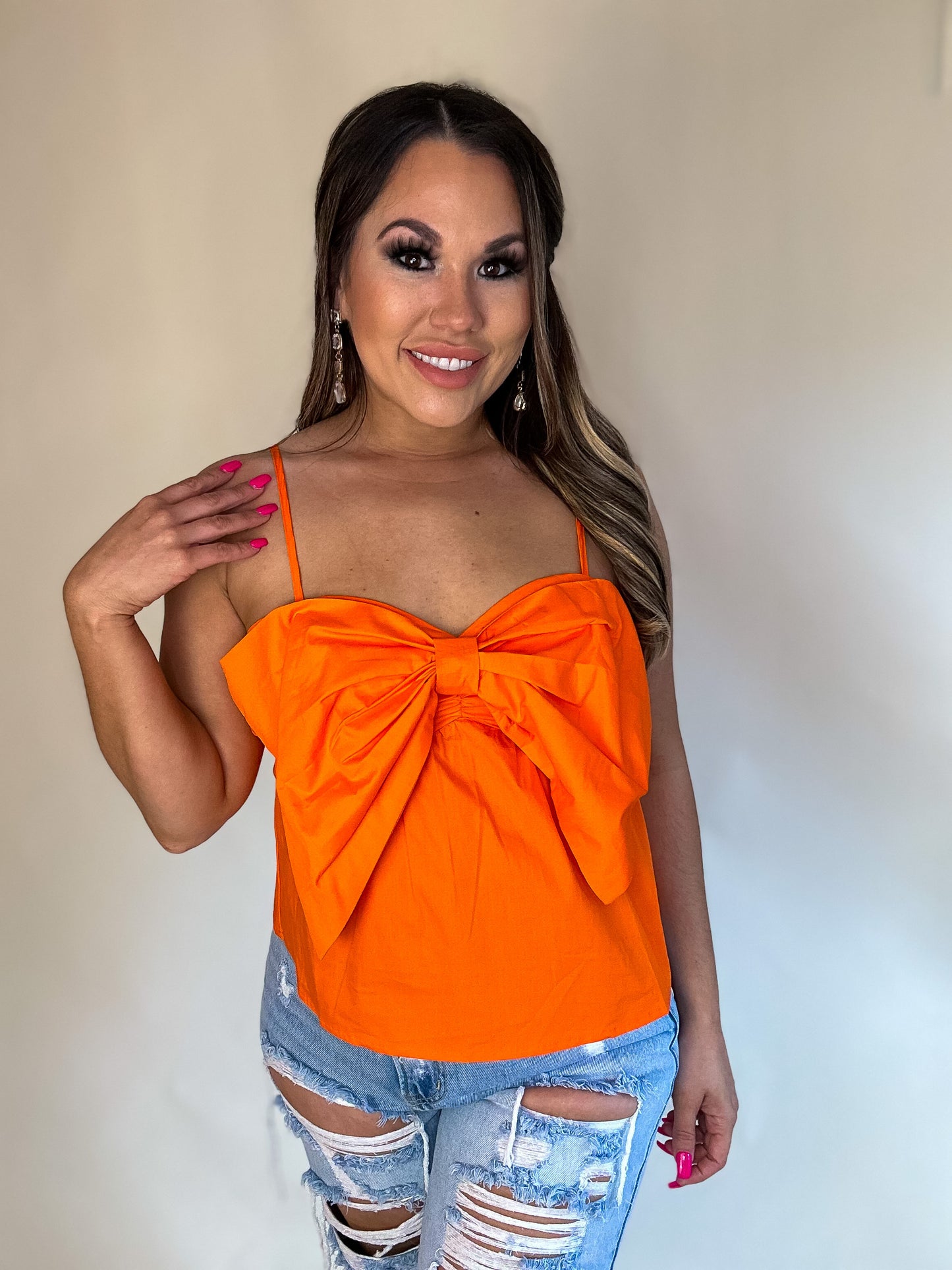 GIVE IT ALL TO YOU ORANGE FRONT BOW KNIT TOP
