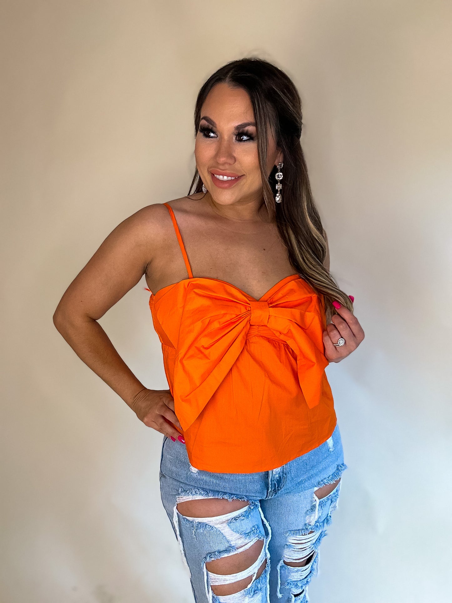 GIVE IT ALL TO YOU ORANGE FRONT BOW KNIT TOP